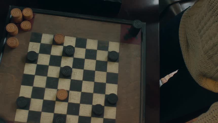 A view of people playing checkers