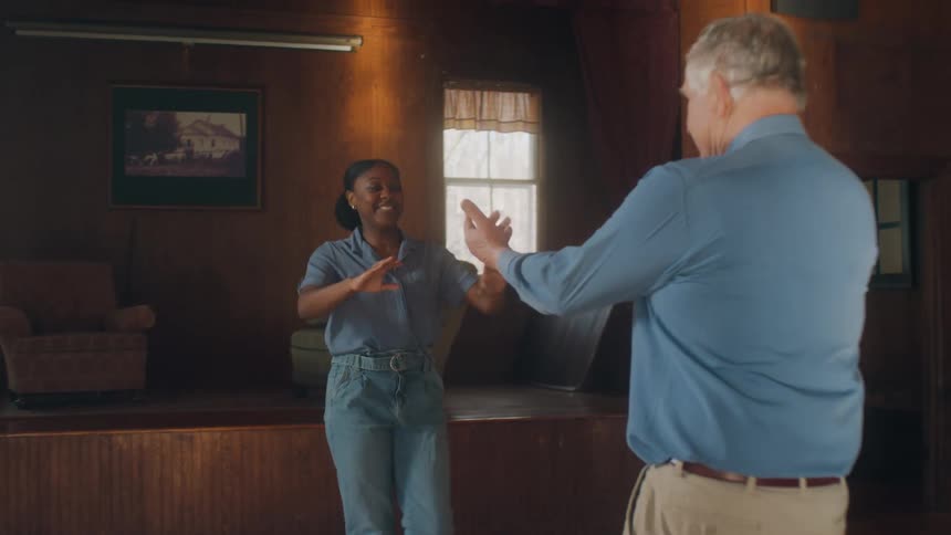 A man and woman dance together