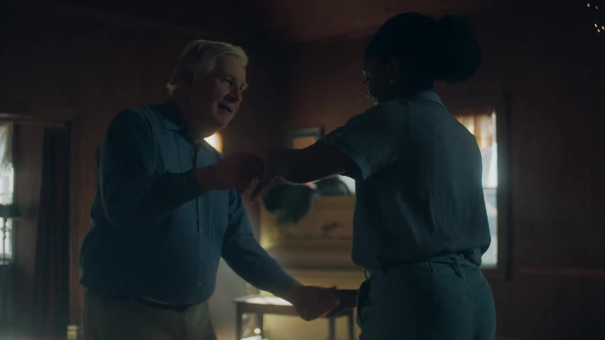 A man and woman dance together
