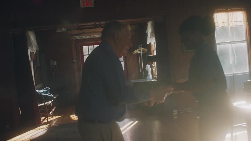 A man and woman dance together