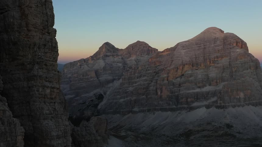 Rock formation and mountain badlands under a clear sky