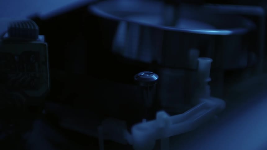 Close up of a machine working in a dark area
