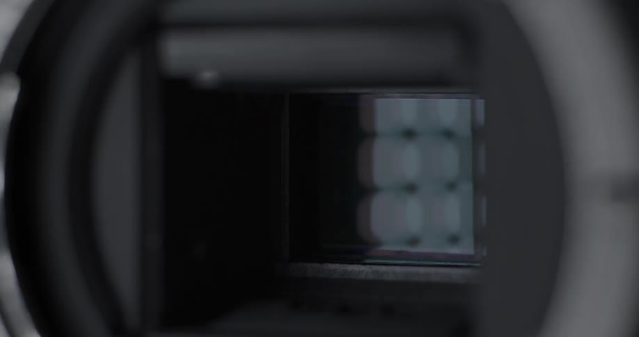 Close-up of a camera lens in action