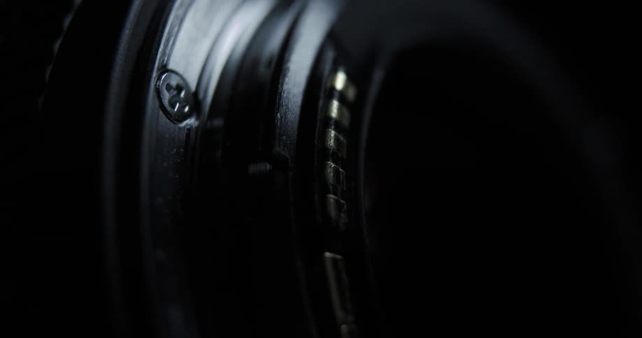 Close-up of a camera in darkness