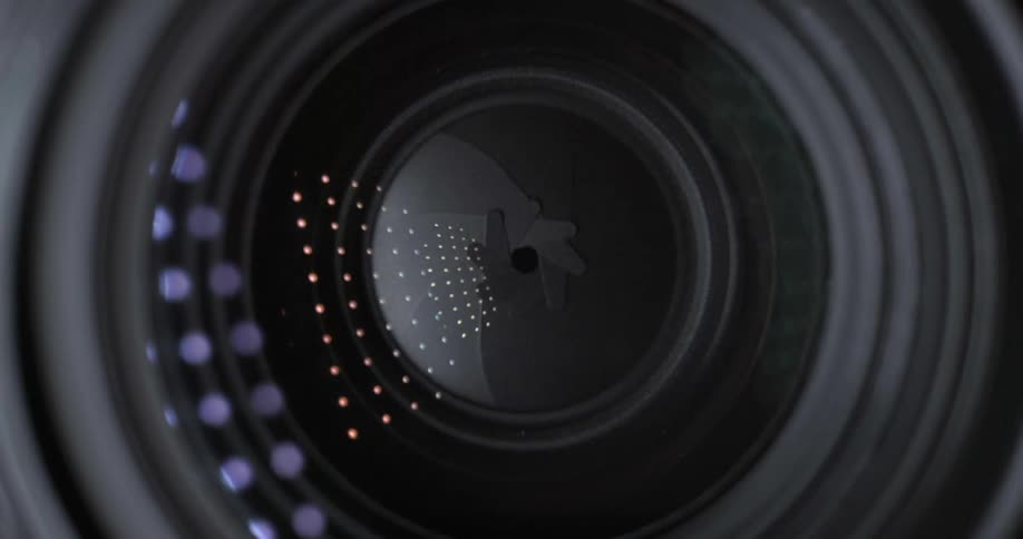 A camera shutter clicks