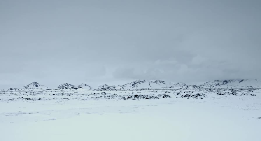 A range of mountains are covered with snow