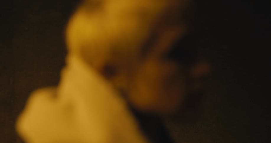 A person walking in a tunnel outdoors