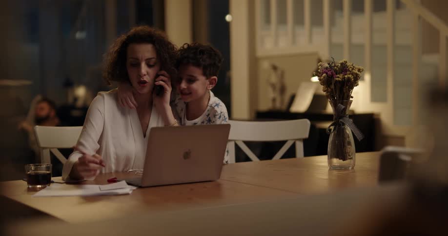 A mother and son in a house