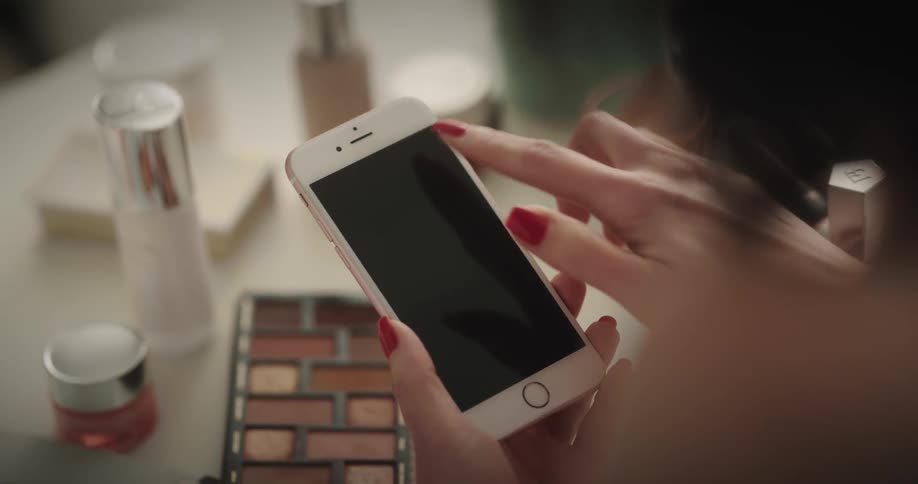 A view of a woman using a smartphone