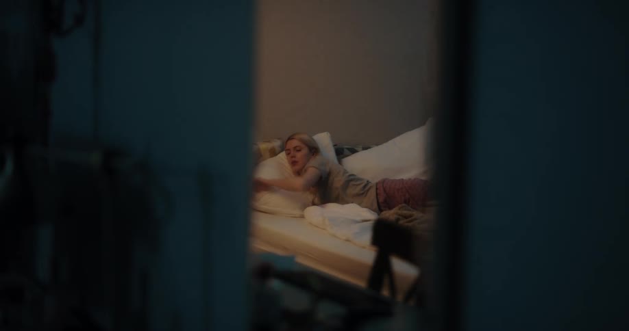 A woman is reading a magazine and then going to bed