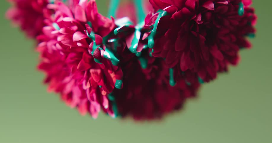 The paint drips from the flower