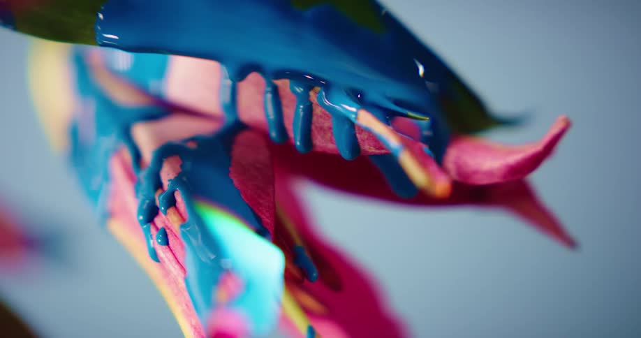 Blue paint dripping off of a flower