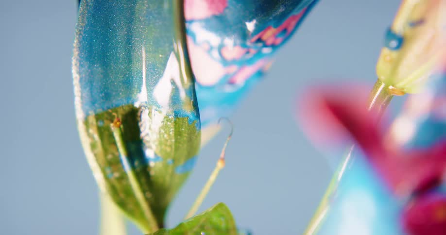 A flower with blue paint on it