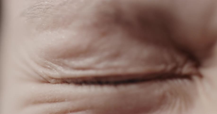 Close up view of a persons eye is displayed