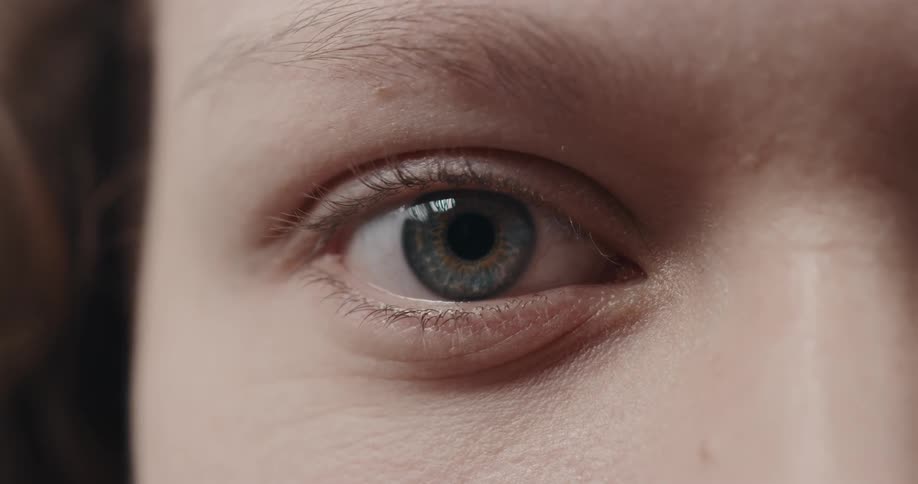 A closeup view of a human face is displayed