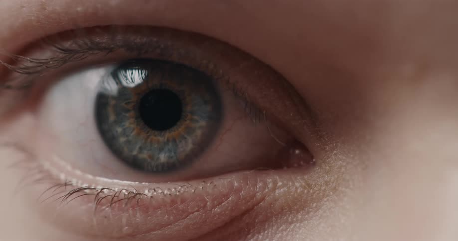 A person tries to not blink