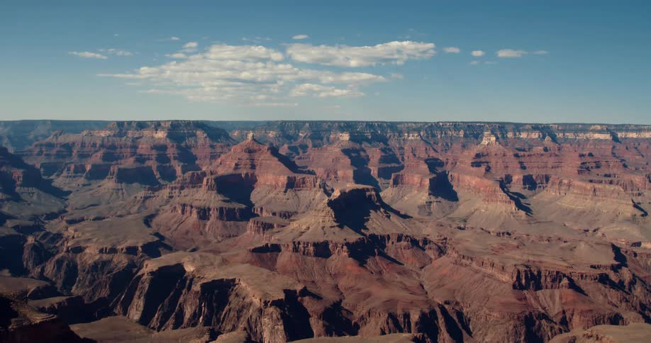 Time lapse of clouds moving over a canyon