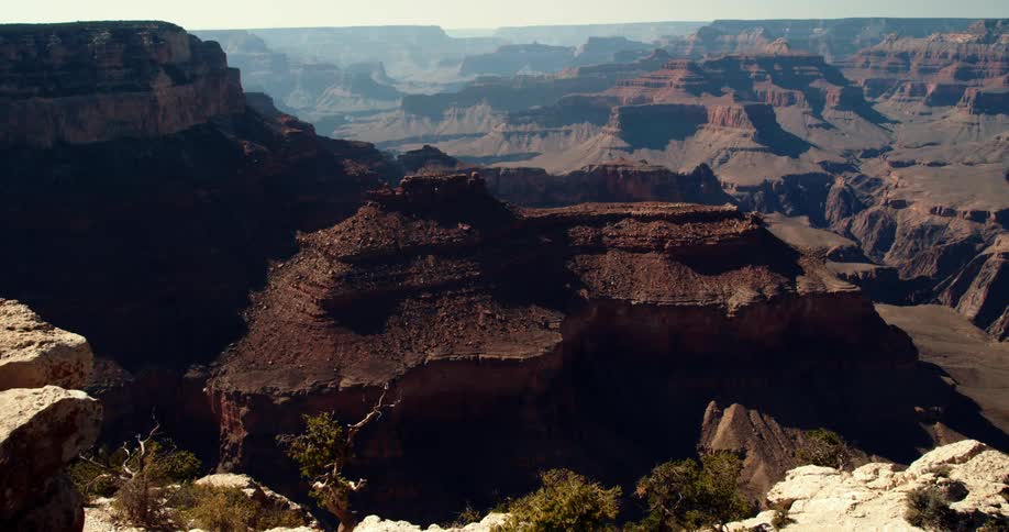 The sun is shining on the canyon