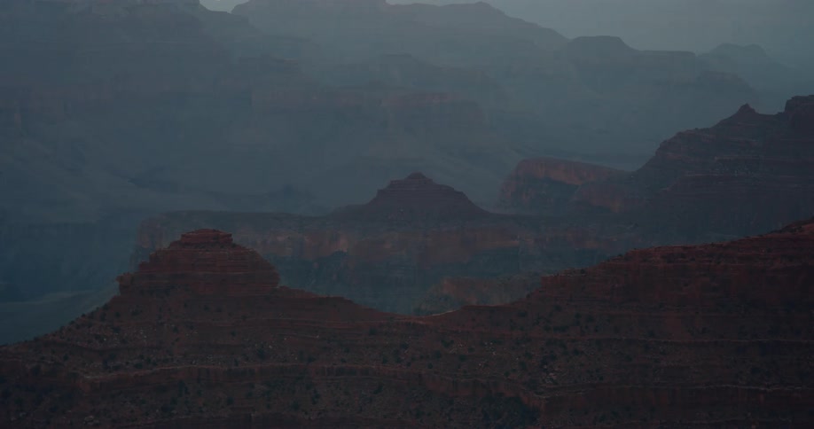 Aerial view of the jagged edges of the mountain tops on the desert at morning
