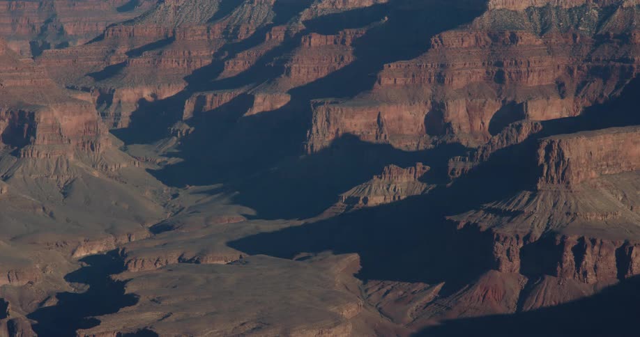 Aerial view of mountains and valleys is displayed