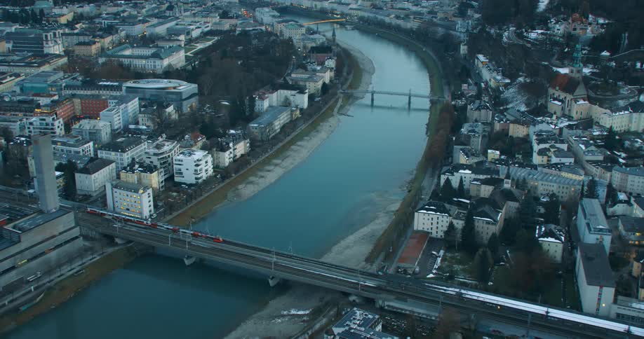 The cars travel over the bridges in the city