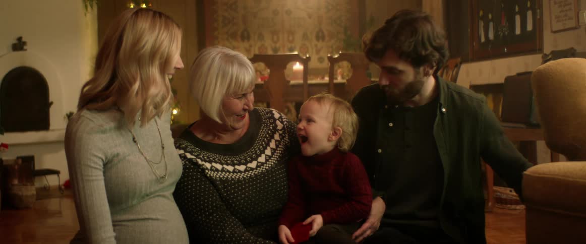 A family talk and laugh at home