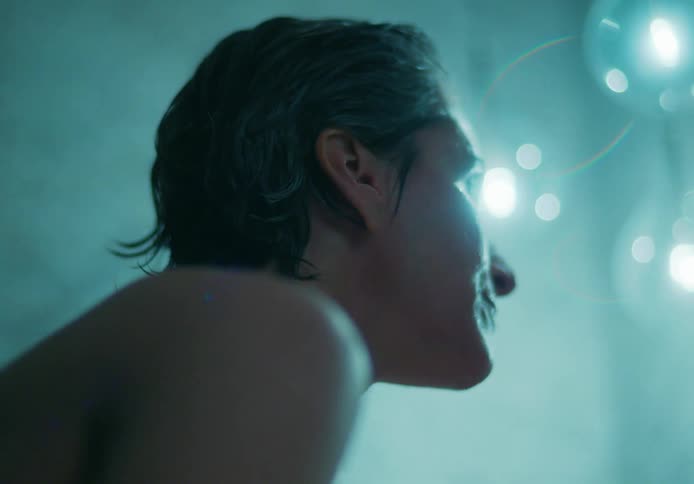 A woman is taking a shower in a bathroom
