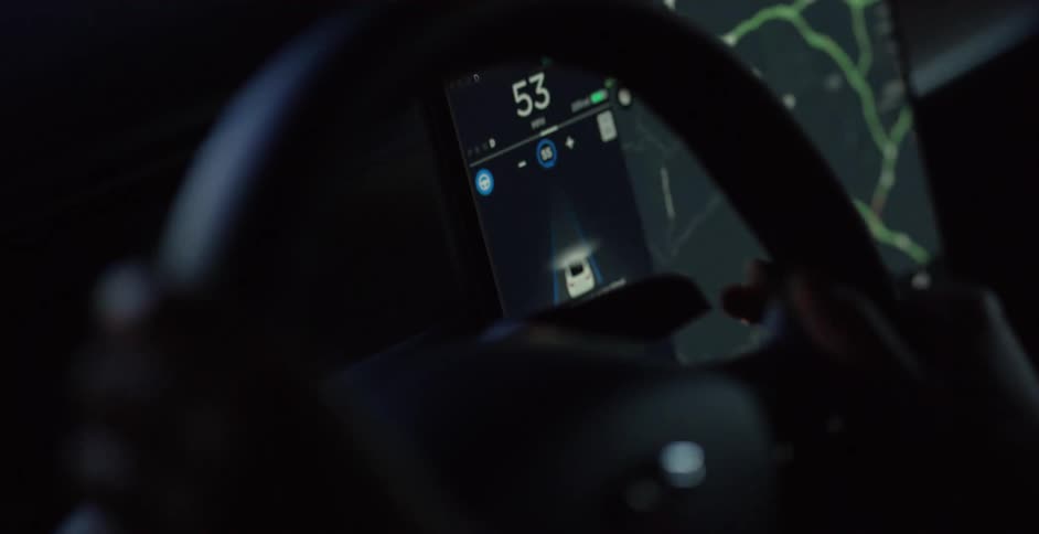 A person is steering the vehicle
