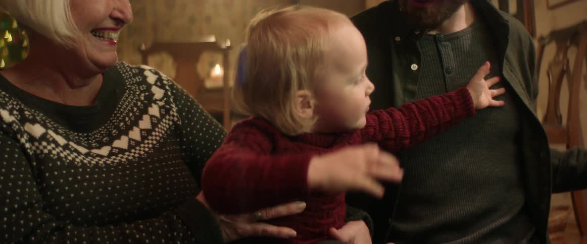 A boy is happy to receive a christmas present