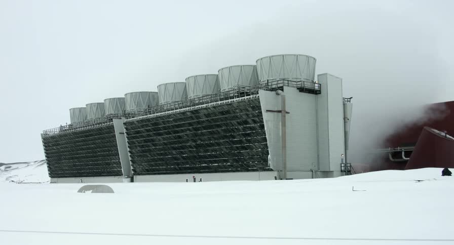 Steam curls around the Krafla power station in Iceland