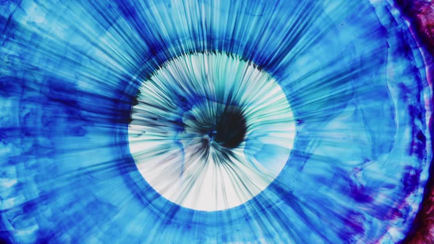 A blue circle shrinks inward as it mixes with white and purple lines