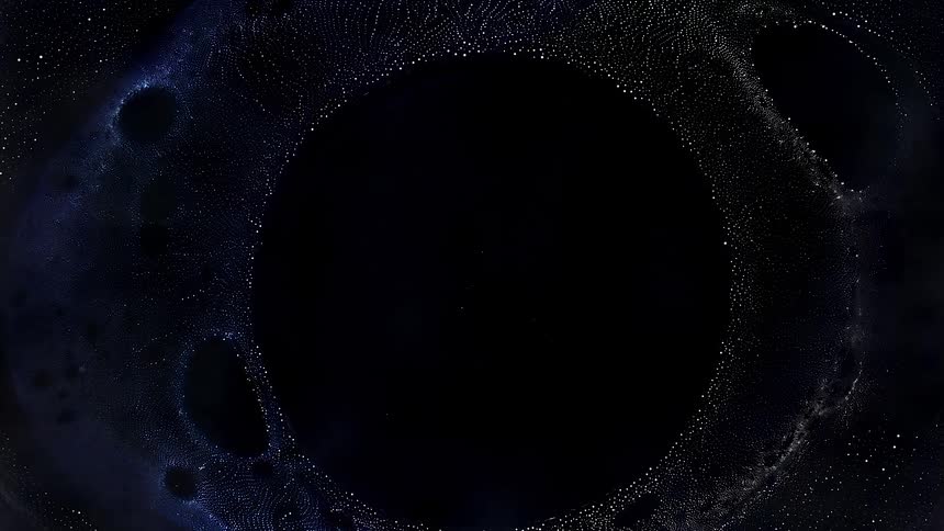 Rings of dots emerge with a circle of darkness inside it like a black hole in the universe