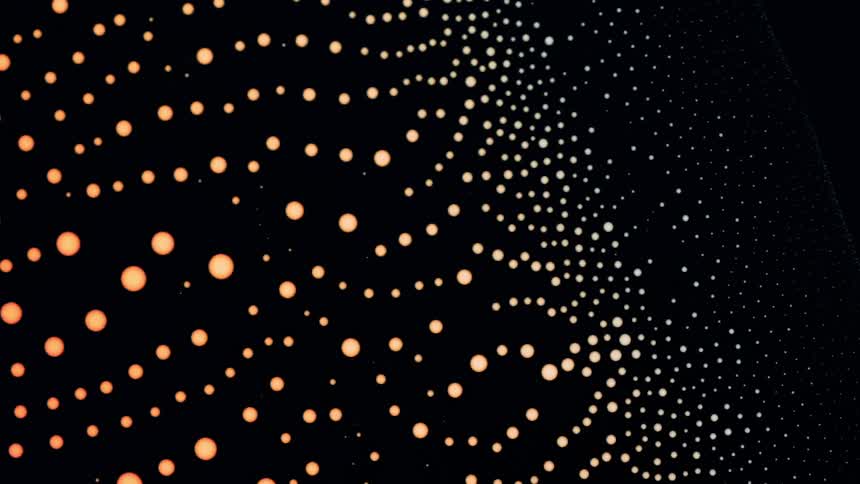 Yellow dots move across the darkness and change color to white
