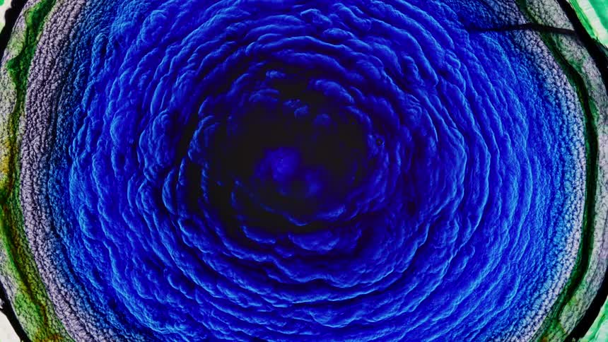 The colors spread and wave in this explosive fractal reaction