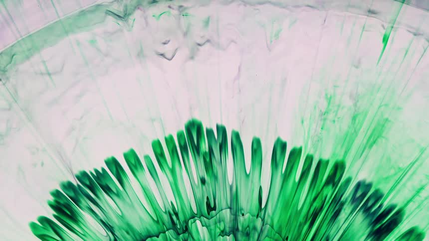 Green colors spread across the white background like a tie dye design