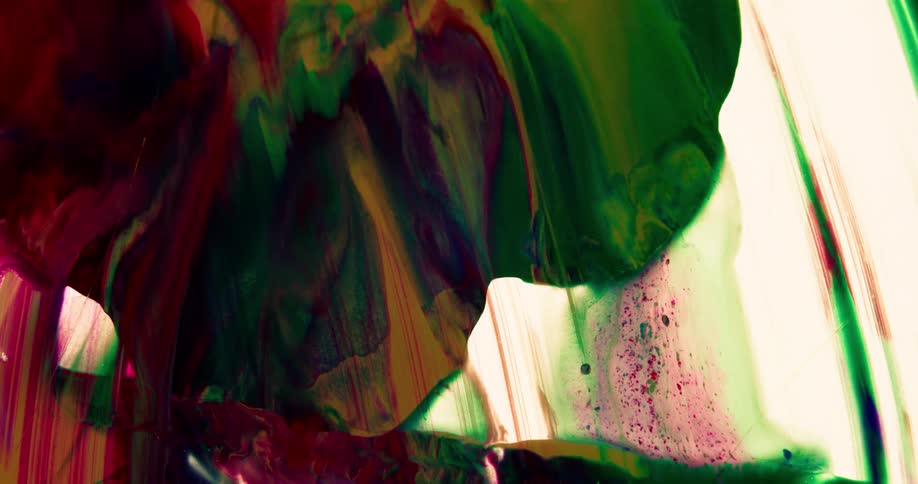Flowing red green and yellow paint