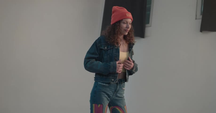 A woman is posing for pictures