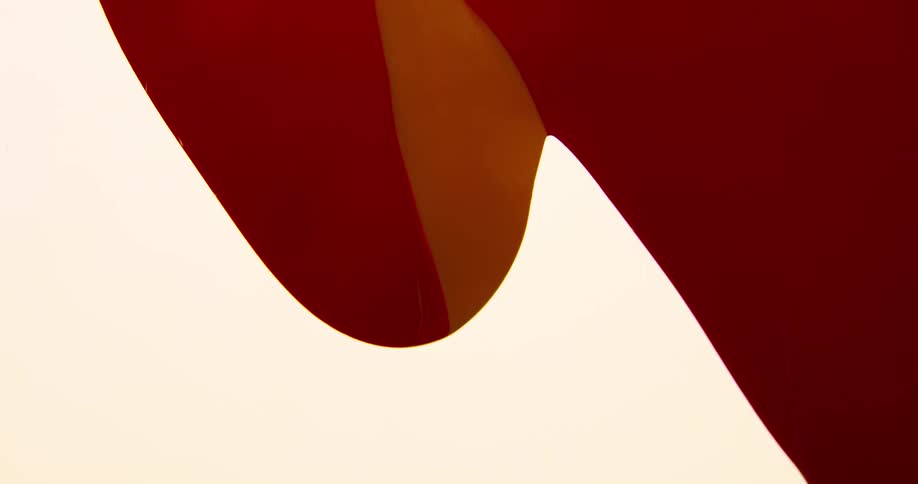 Red paint dripping down a white background