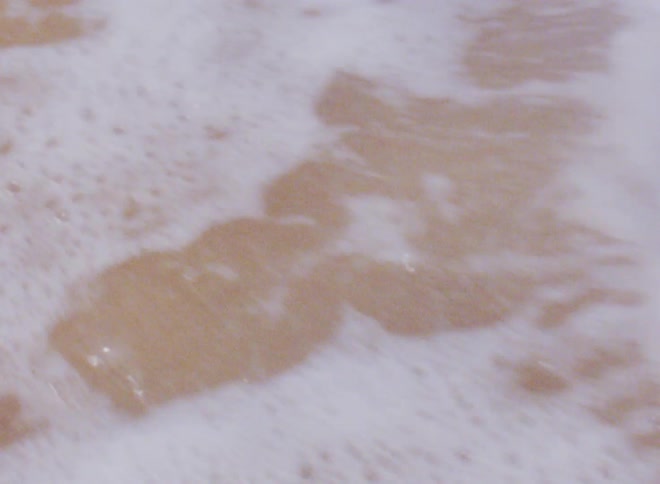 Ocean water waves moving towards the beach
