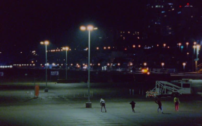 A group of people are stretching in a city