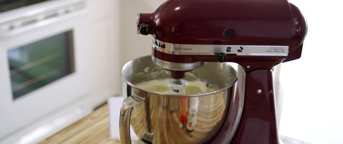 A mixer mixing dough