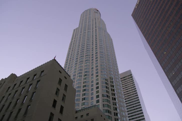 View of buildings in a city is displayed at dusk