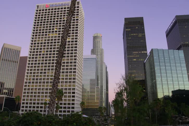 The sky is purple behind the skyline