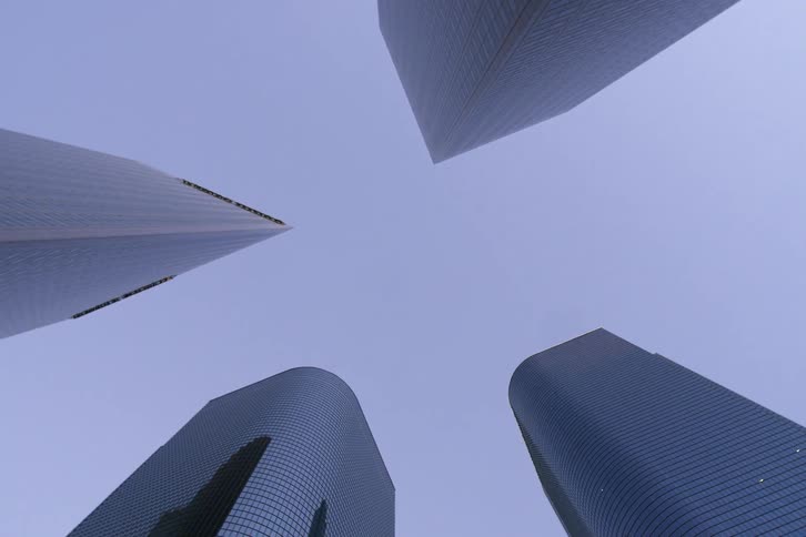 View looking up at tall skyscrapers