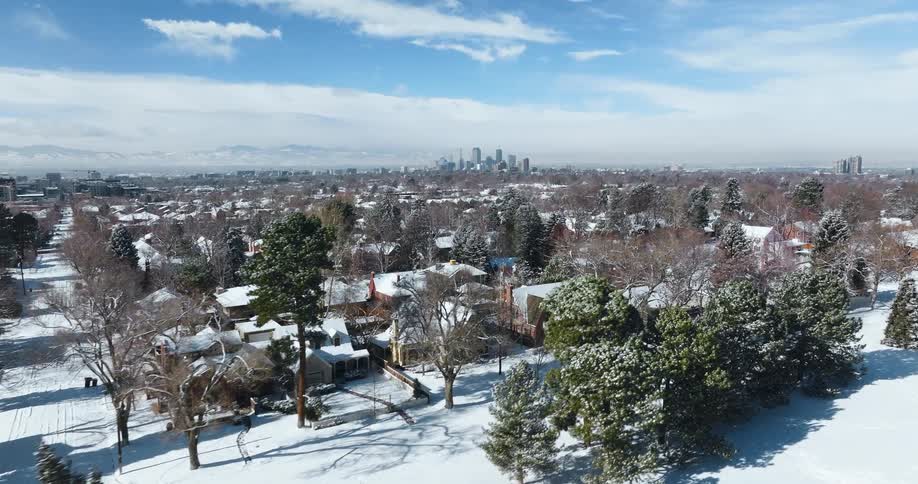 Snow is covering the suburban area in winter