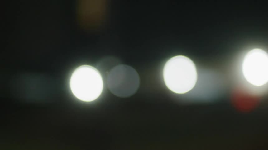Abstract footage of lights flashing at night