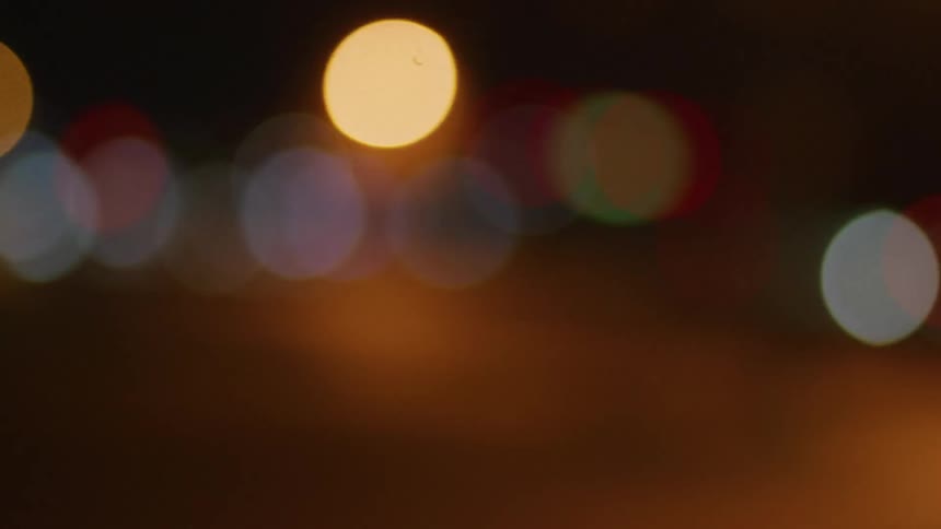 Abstract footage of bright lights outside at night