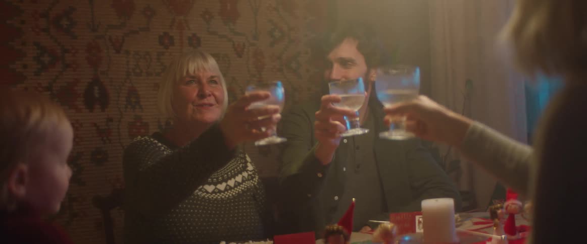 A group of people sitting at a table together