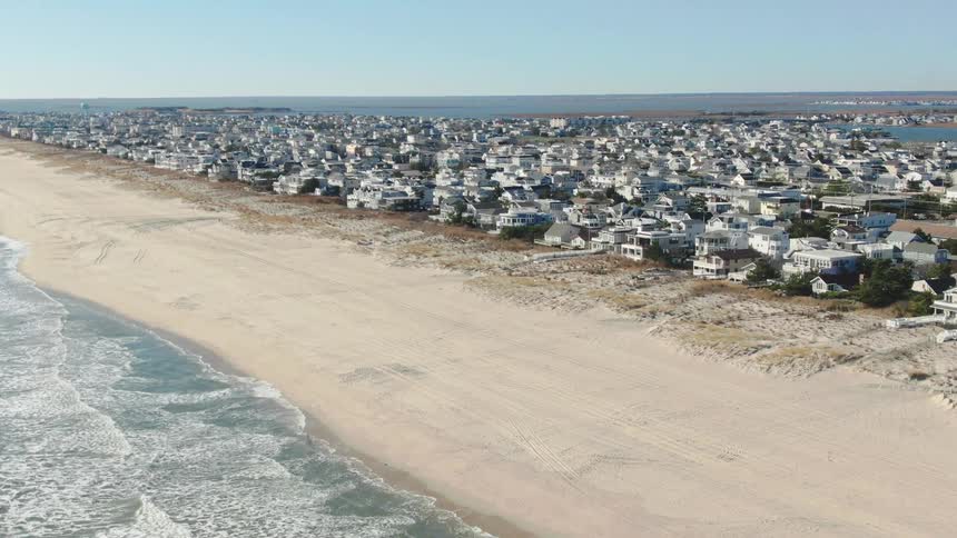 An aerial view of a neighborhood on the beach
