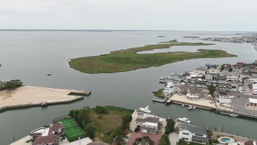 Aerial view of an island by the mansions